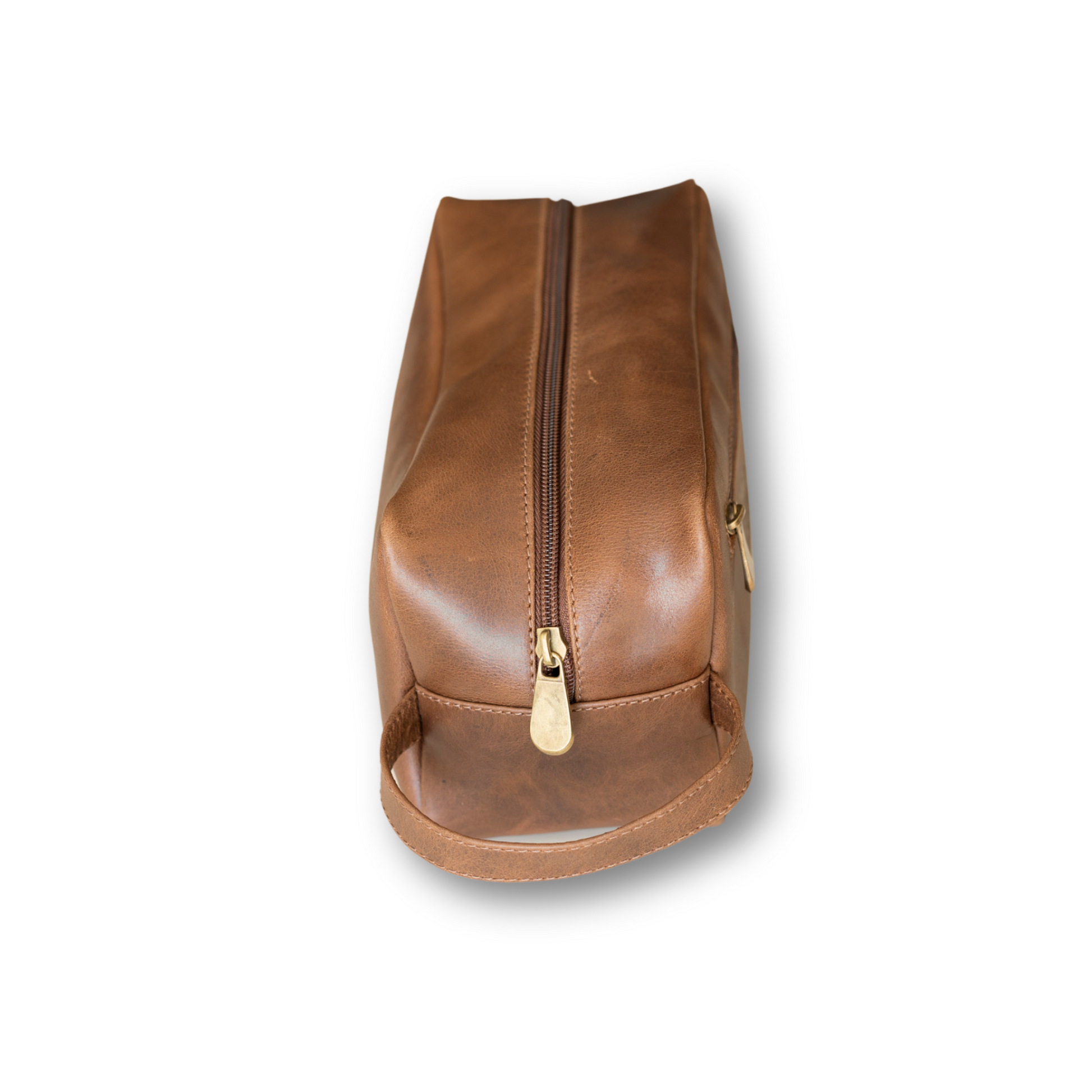 vista lateral de neceser de cuero café rustico